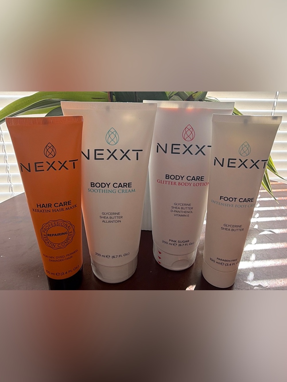 4 -Nexx Body Care Soothing & Glitter Creams - White with Teal and Pink Accents